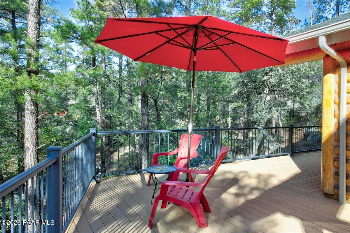 835 Happy Valley Road Prescott, AZ 86305 - Photo 34 of 48 a view of deck with furniture and umbrella