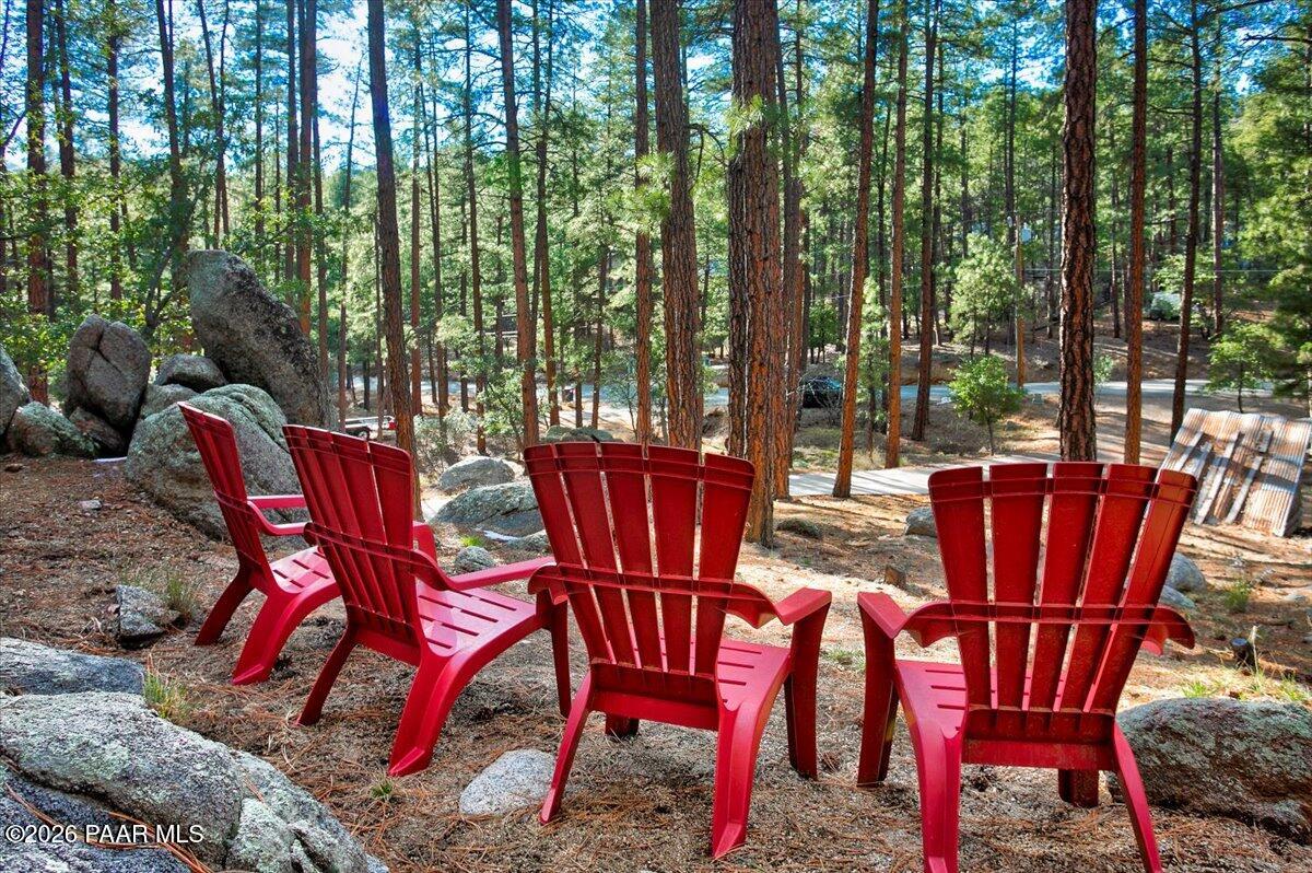 835 Happy Valley Road Prescott, AZ 86305 - Photo 37 of 48 a view of a chairs and table in the outdoor