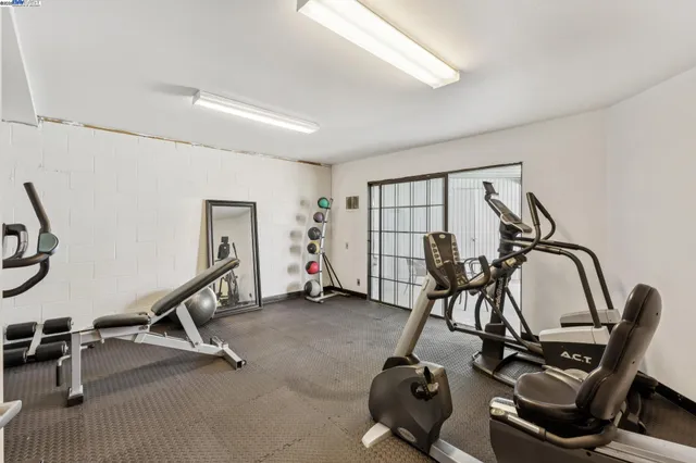 a view of a room with gym equipment