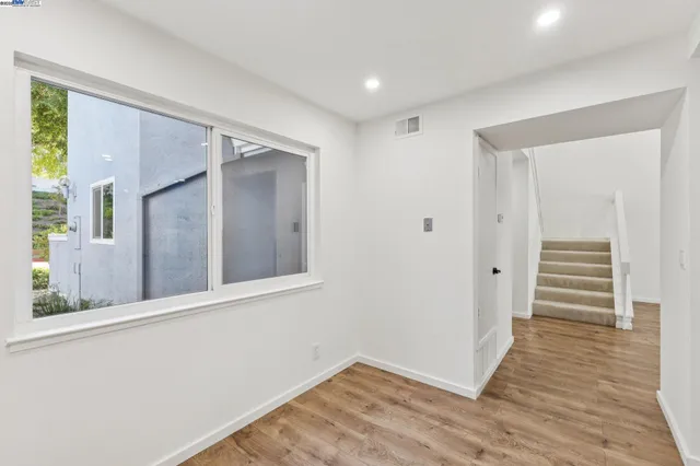 an empty room with windows