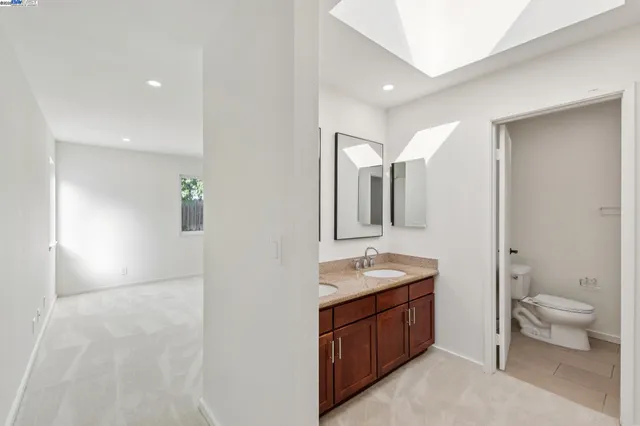 a view of a bathroom with a glass door
