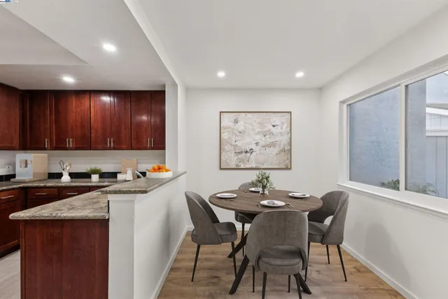 a view of a dining room with furniture