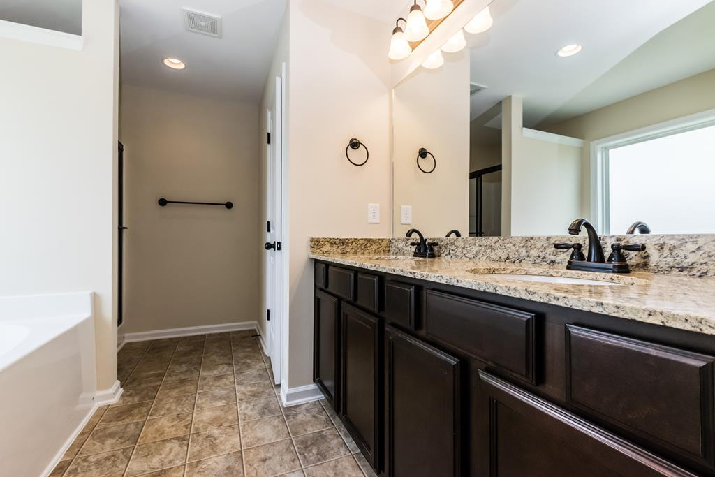 711 Justify Loop Graniteville, SC 29829 - Photo 7 of 13 Luxurious master bath w/ double vanities/ / photo