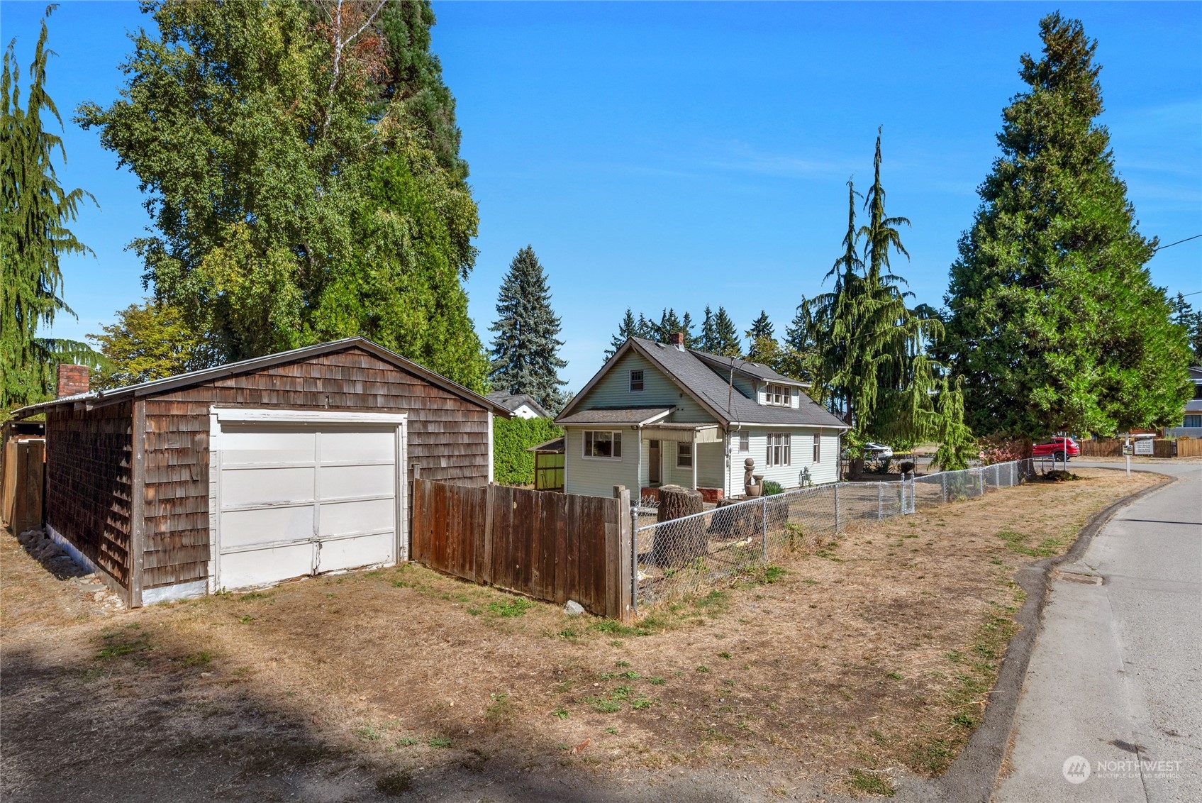 5416 Rockefeller Avenue Everett, WA 98203 - Photo 21 of 35 a view of a house with a yard and large tree
