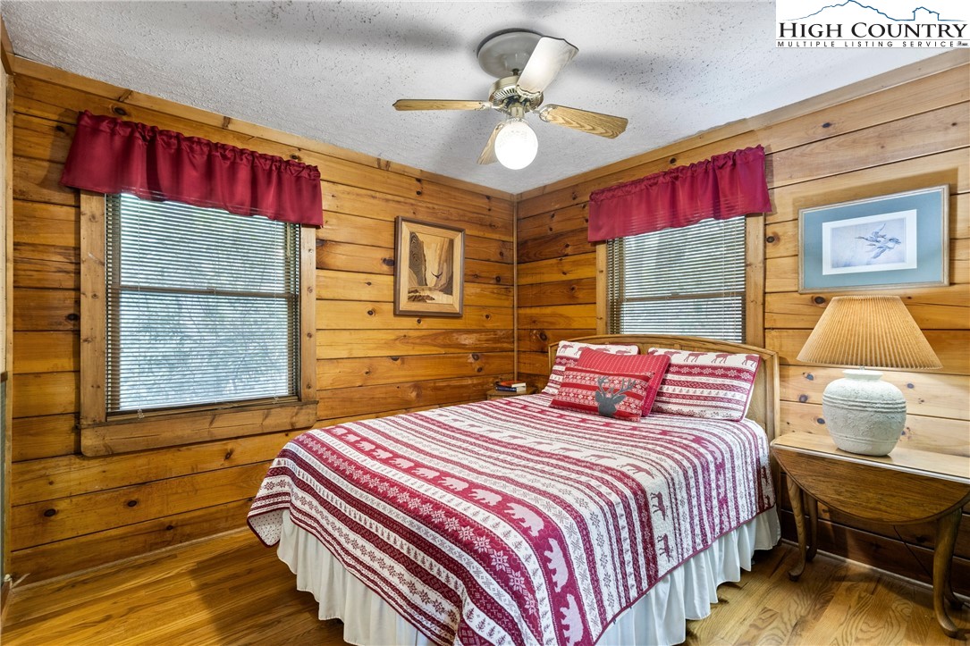 289 Grandview Drive Seven Devils, NC 28604 - Photo 20 of 43 a bedroom with a bed and window