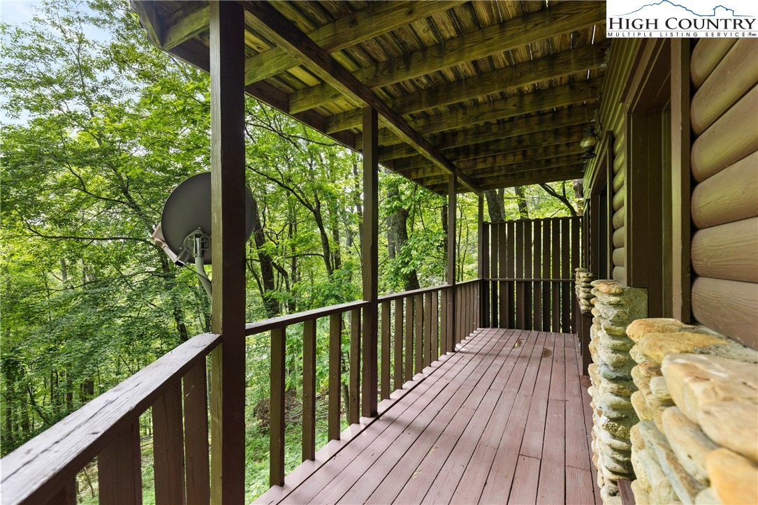 289 Grandview Drive Seven Devils, NC 28604 - Photo 39 of 43 a balcony with wooden floor in outdoor space