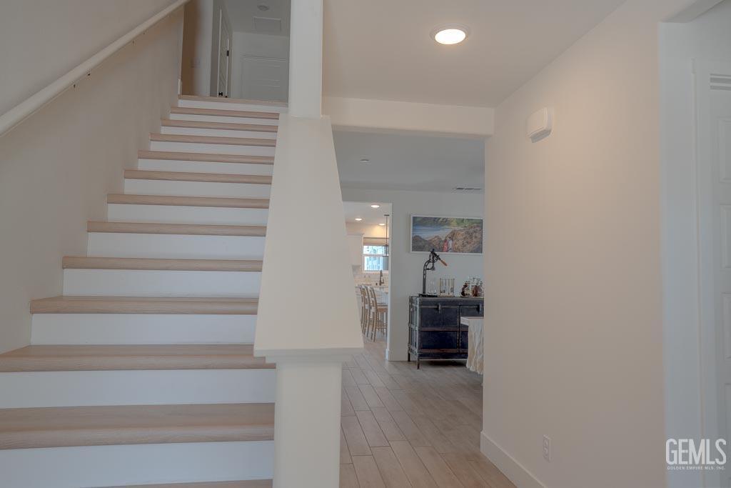 Undisclosed Address Bakersfield, CA 93311 - Photo 12 of 24 a view of entryway and hall with wooden floor