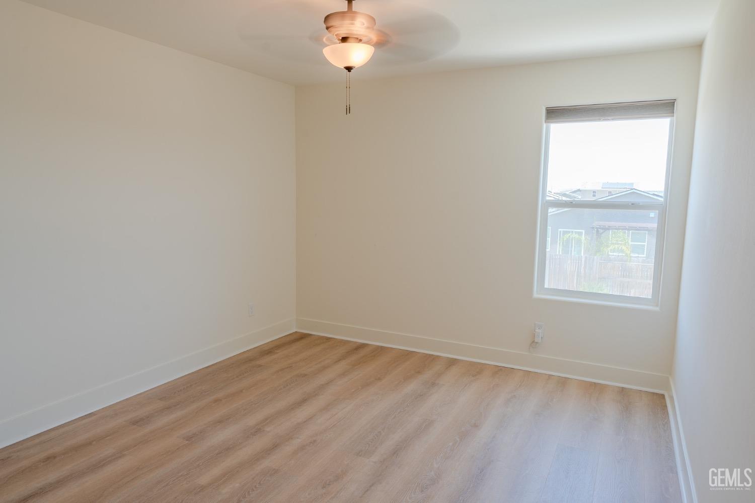 Undisclosed Address Bakersfield, CA 93311 - Photo 18 of 24 an empty room with a window