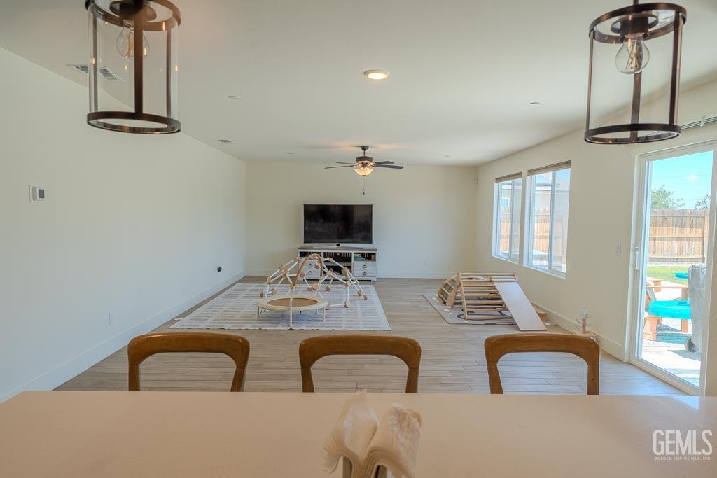 Undisclosed Address Bakersfield, CA 93311 - Photo 8 of 24 a view of a dining room with furniture
