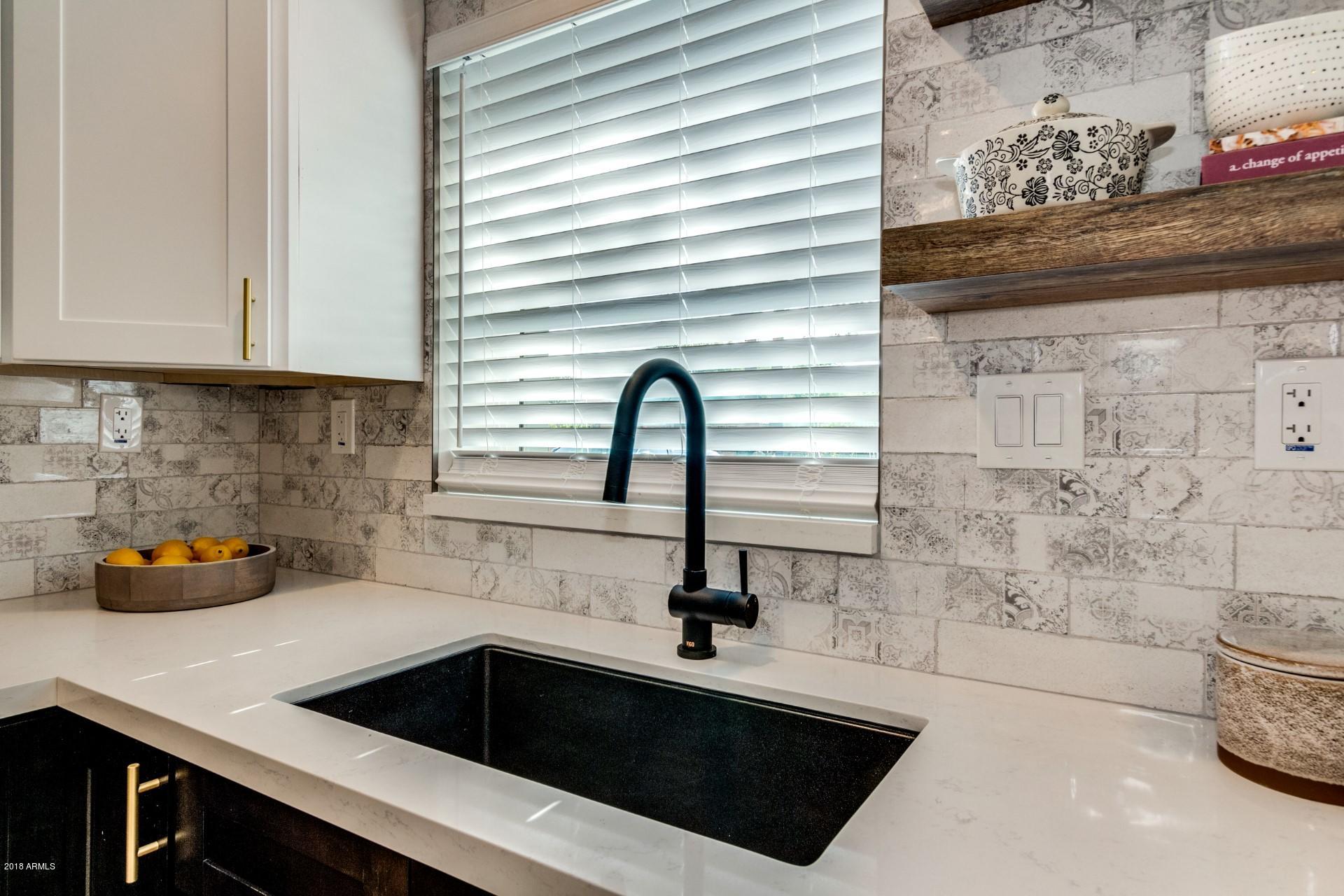 1438 East Granada Road Phoenix, AZ 85006 - Photo 18 of 35 a kitchen with a sink and a window
