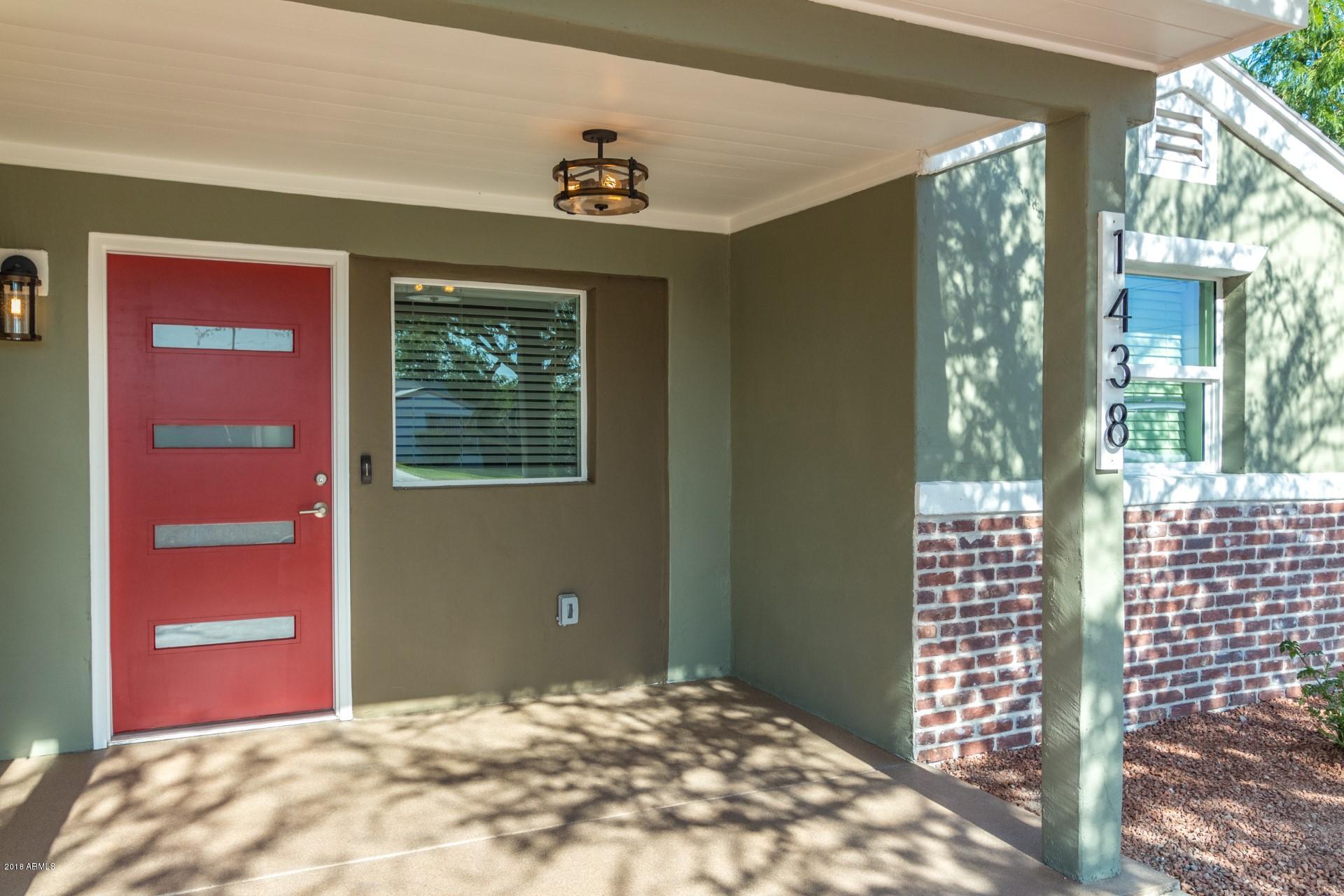 1438 East Granada Road Phoenix, AZ 85006 - Photo 4 of 35 a view of an empty room with a window