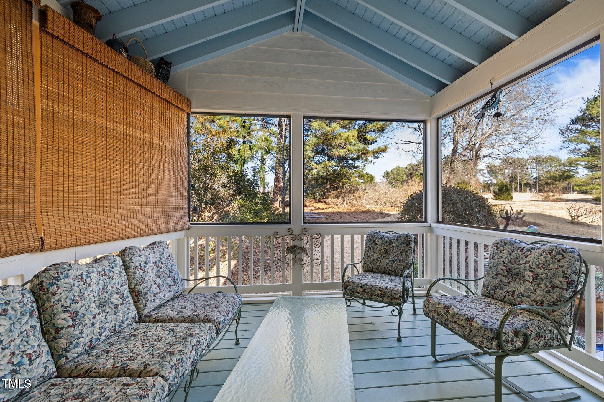 203 Stoney Drive Durham, NC 27703 - Photo 40 of 59 a balcony with furniture and a couch