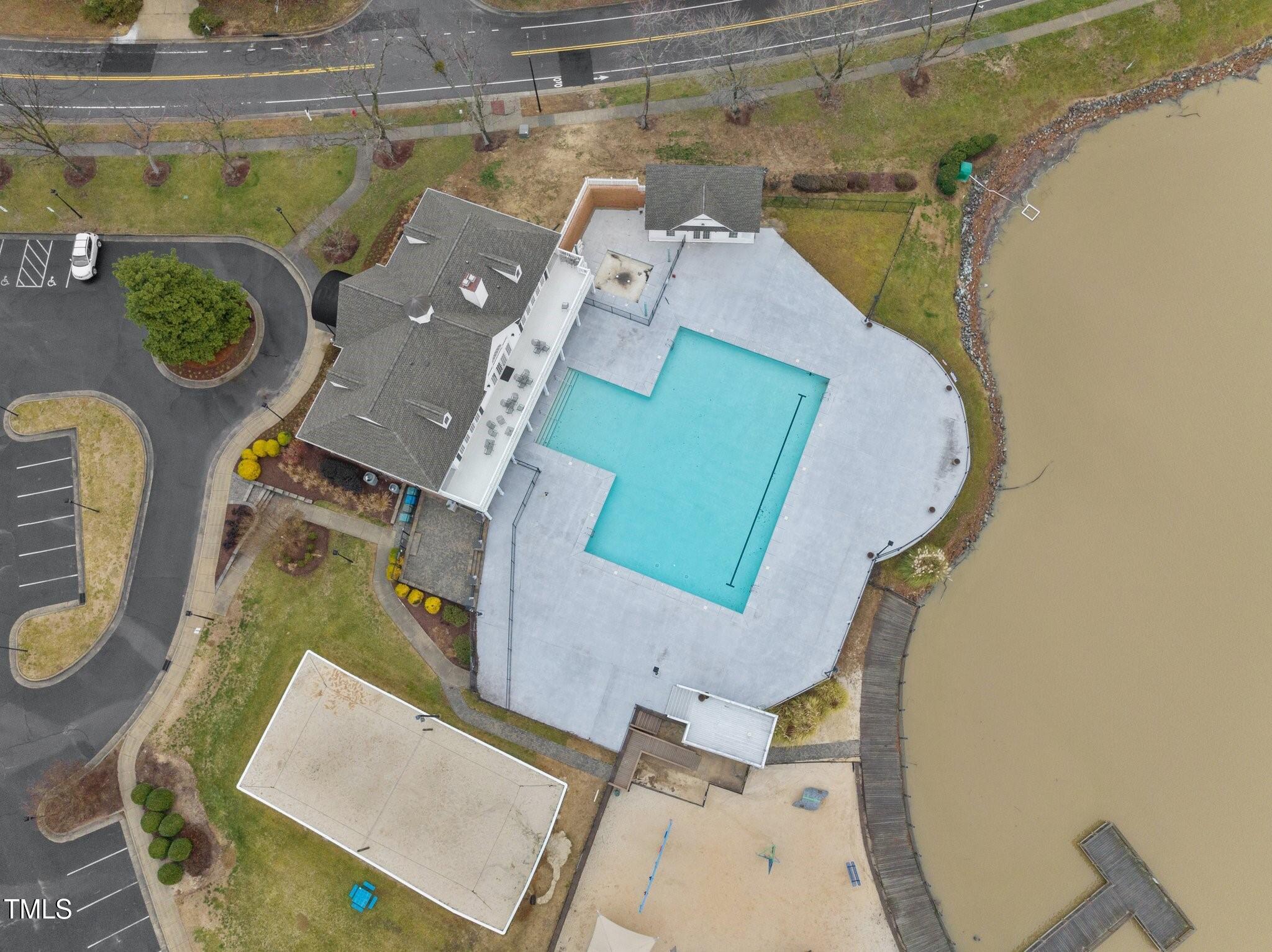 203 Stoney Drive Durham, NC 27703 - Photo 54 of 59 an aerial view of a house with a swimming pool