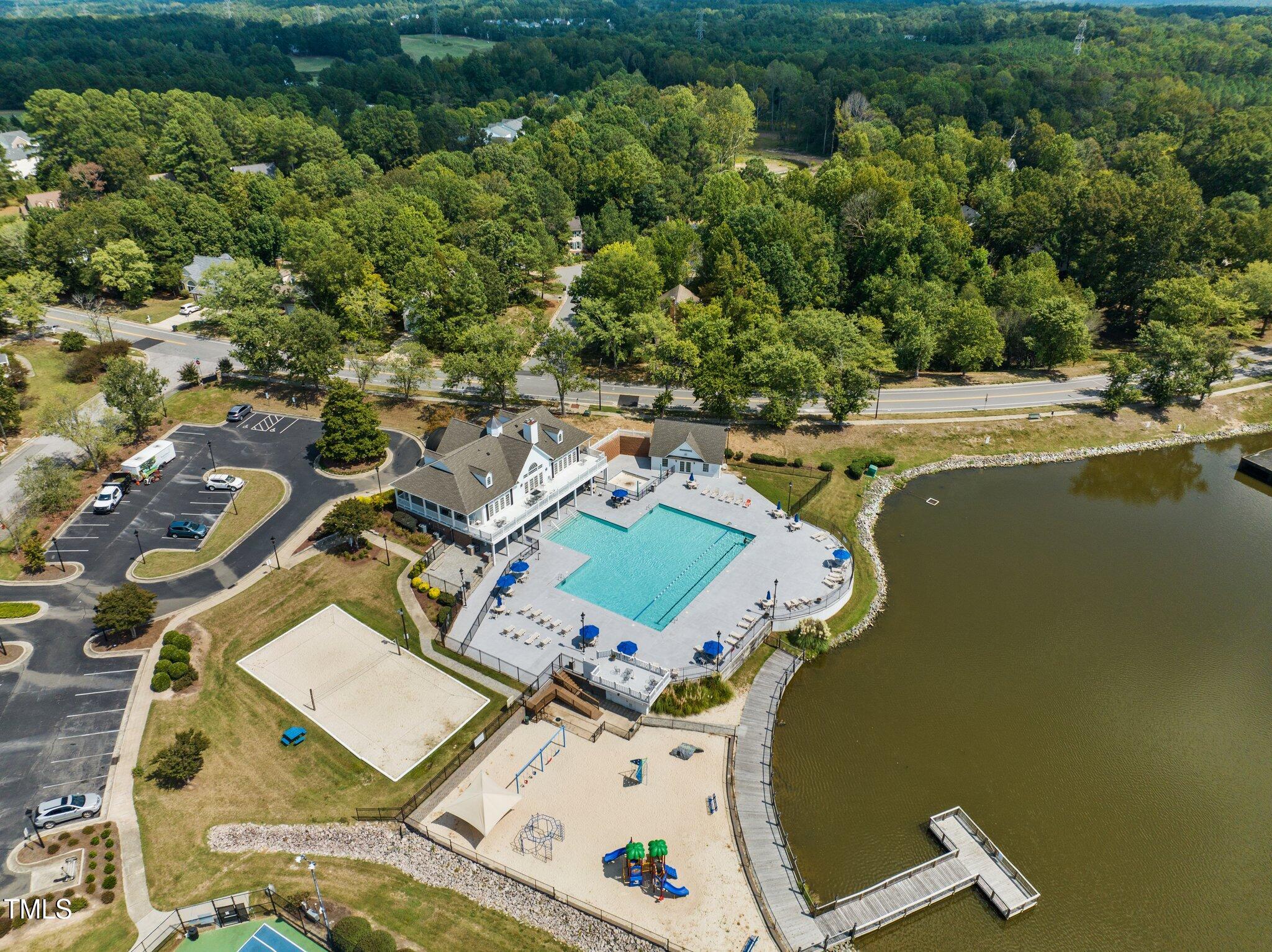 203 Stoney Drive Durham, NC 27703 - Photo 57 of 59 an aerial view of a house with a swimming pool