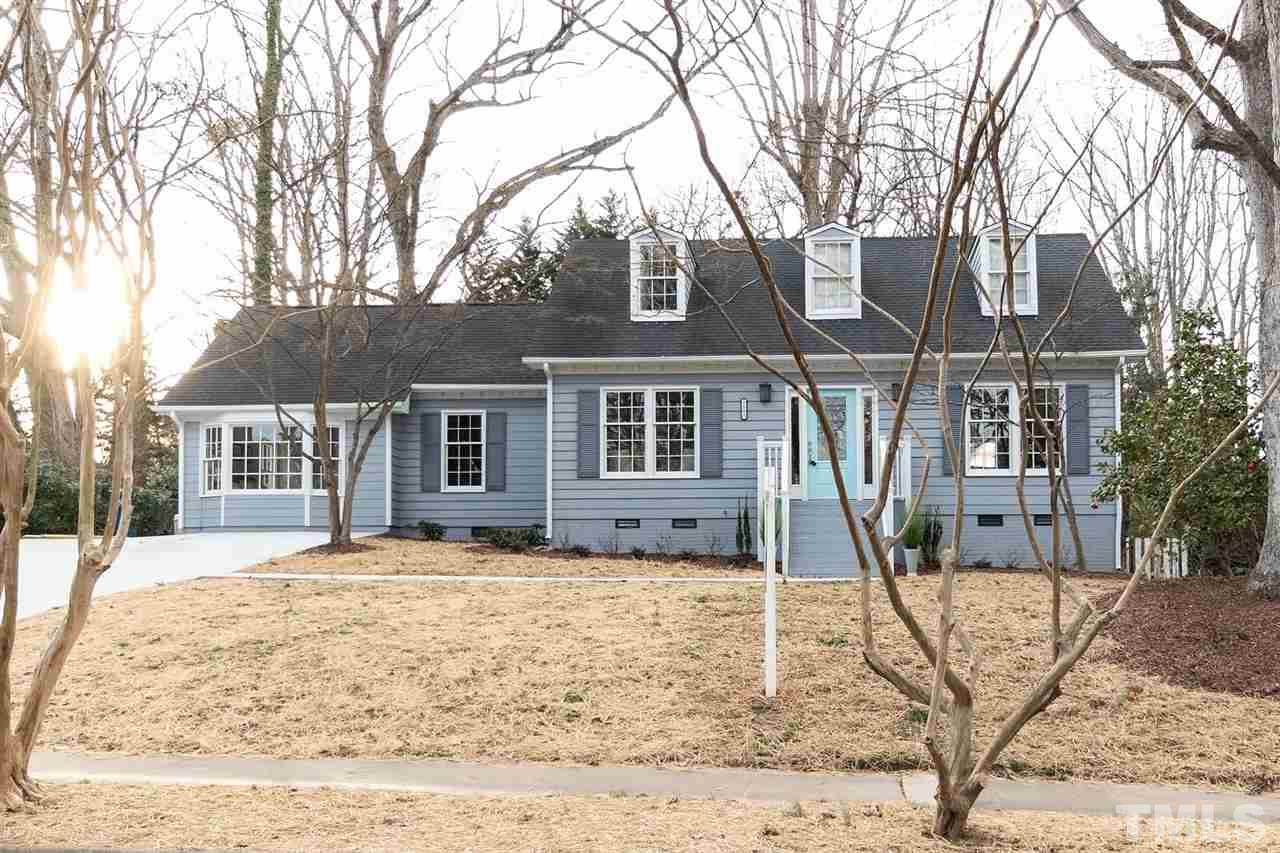 5501 Knollwood Road Raleigh, NC 27609 - Photo 2 of 25 front view of a house with a yard
