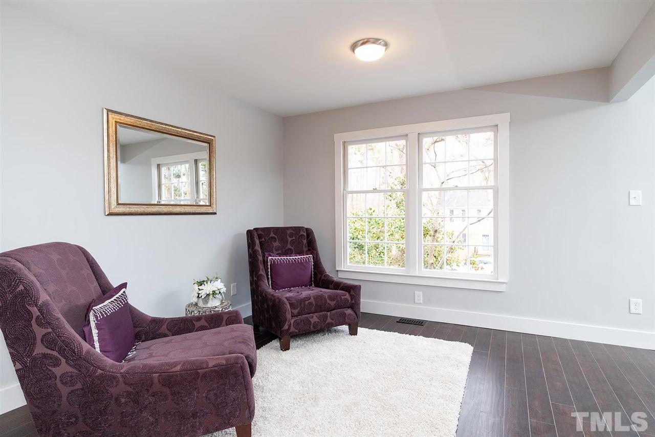 5501 Knollwood Road Raleigh, NC 27609 - Photo 11 of 25 a living room with furniture and a window