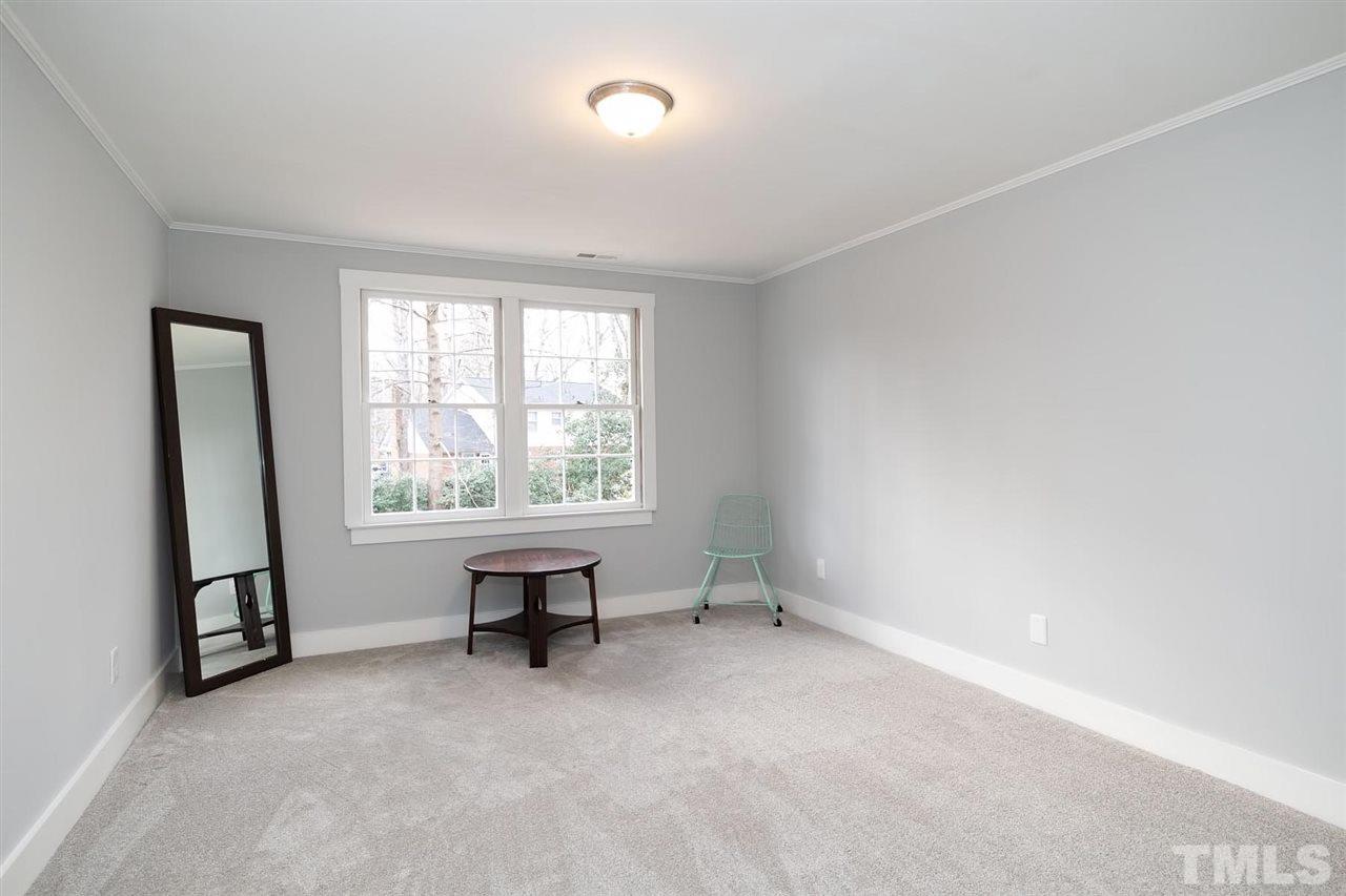 5501 Knollwood Road Raleigh, NC 27609 - Photo 18 of 25 an empty room with windows