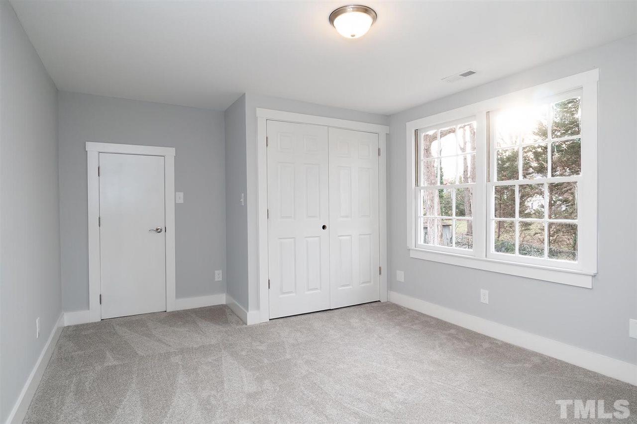 5501 Knollwood Road Raleigh, NC 27609 - Photo 19 of 25 an empty room with a window