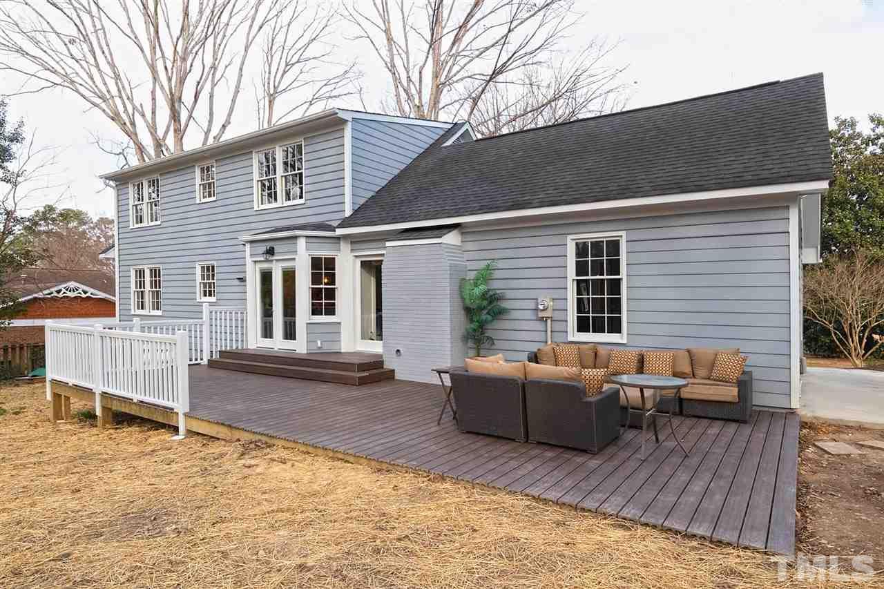5501 Knollwood Road Raleigh, NC 27609 - Photo 22 of 25 a backyard of a house with seating space