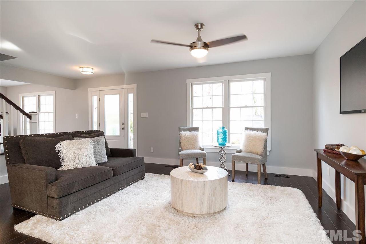 5501 Knollwood Road Raleigh, NC 27609 - Photo 4 of 25 a living room with furniture and a window