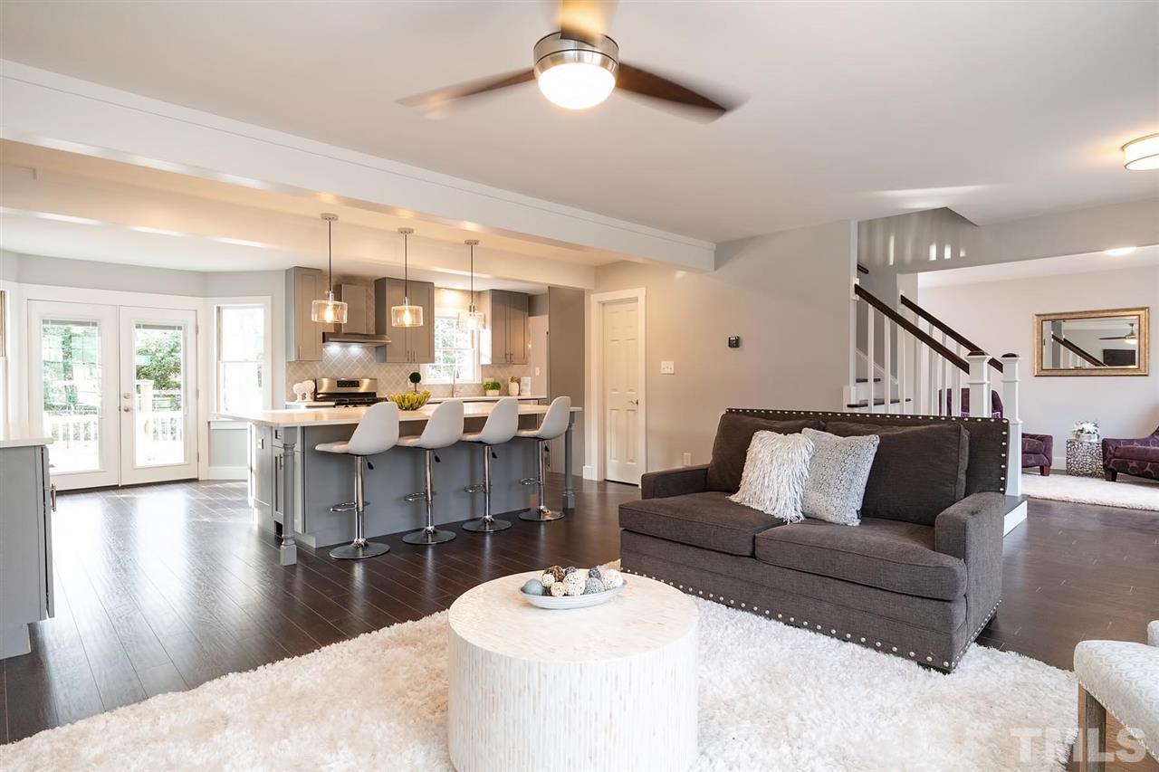 5501 Knollwood Road Raleigh, NC 27609 - Photo 6 of 25 a living room with furniture and a wooden floor