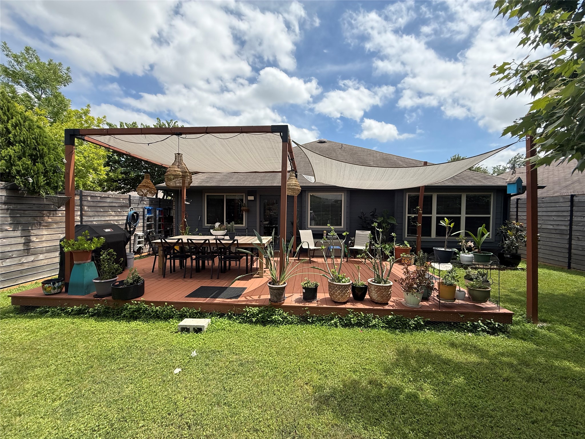 7108 Hester Road Austin, TX 78725 - Photo 20 of 25 a view of a house with backyard and porch