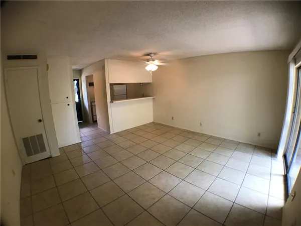 a view of a utility room with mirror