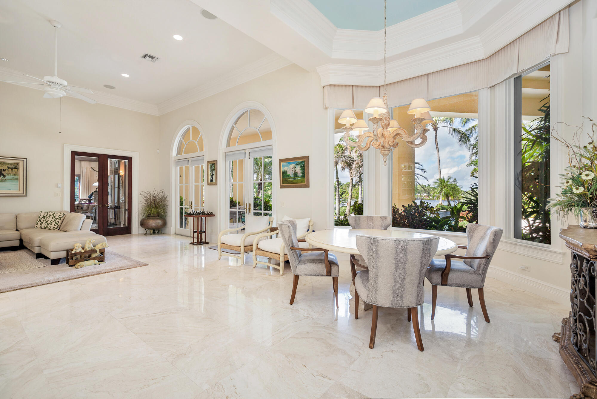 19223 North Riverside Drive Tequesta, FL 33469 - Photo 20 of 83 a living room with furniture and a large window