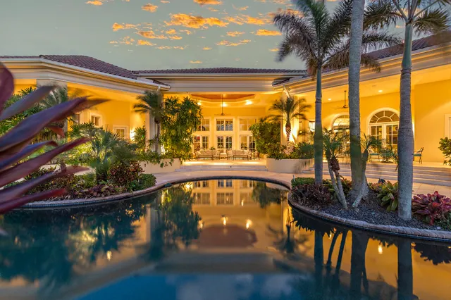 a view of swimming pool from a balcony