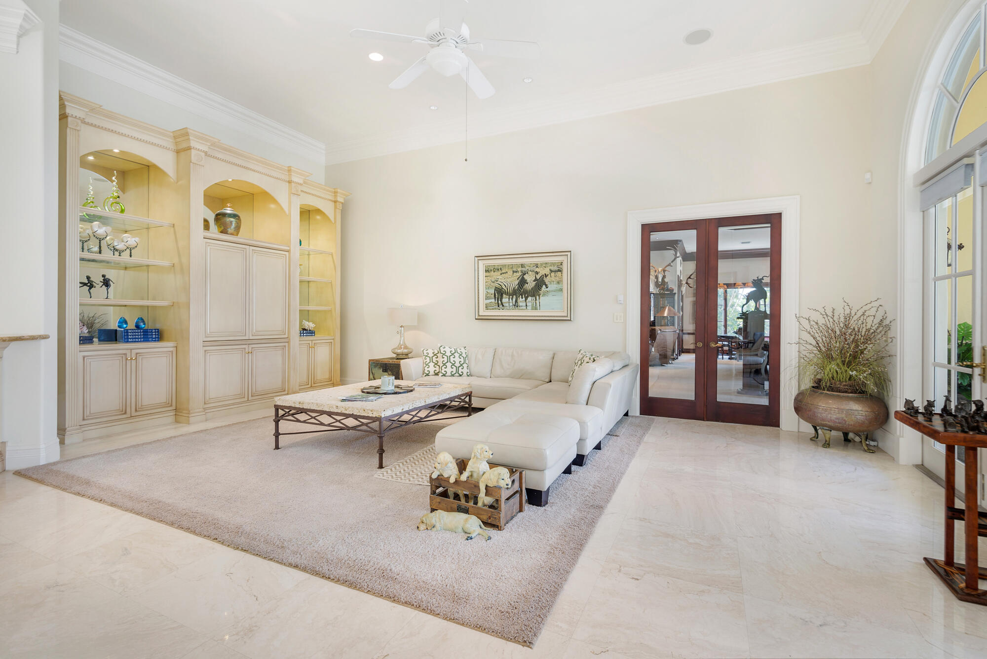 19223 North Riverside Drive Tequesta, FL 33469 - Photo 21 of 83 a living room with furniture and a table