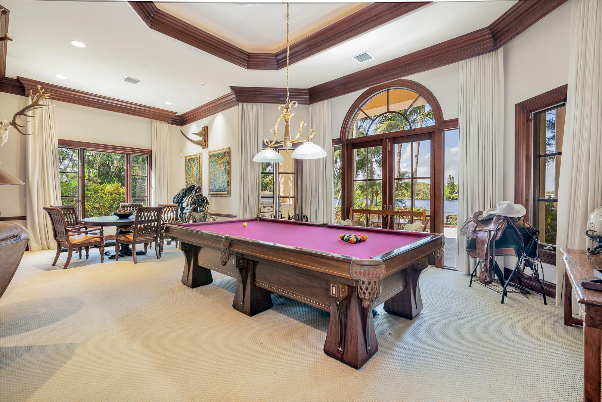 19223 North Riverside Drive Tequesta, FL 33469 - Photo 23 of 83 a room with furniture pool table and windows