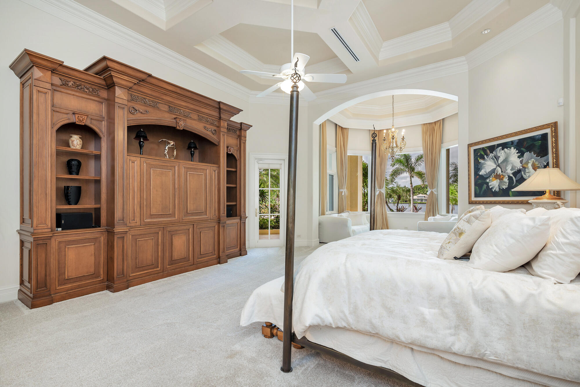 19223 North Riverside Drive Tequesta, FL 33469 - Photo 25 of 83 a bedroom with a bed and a television