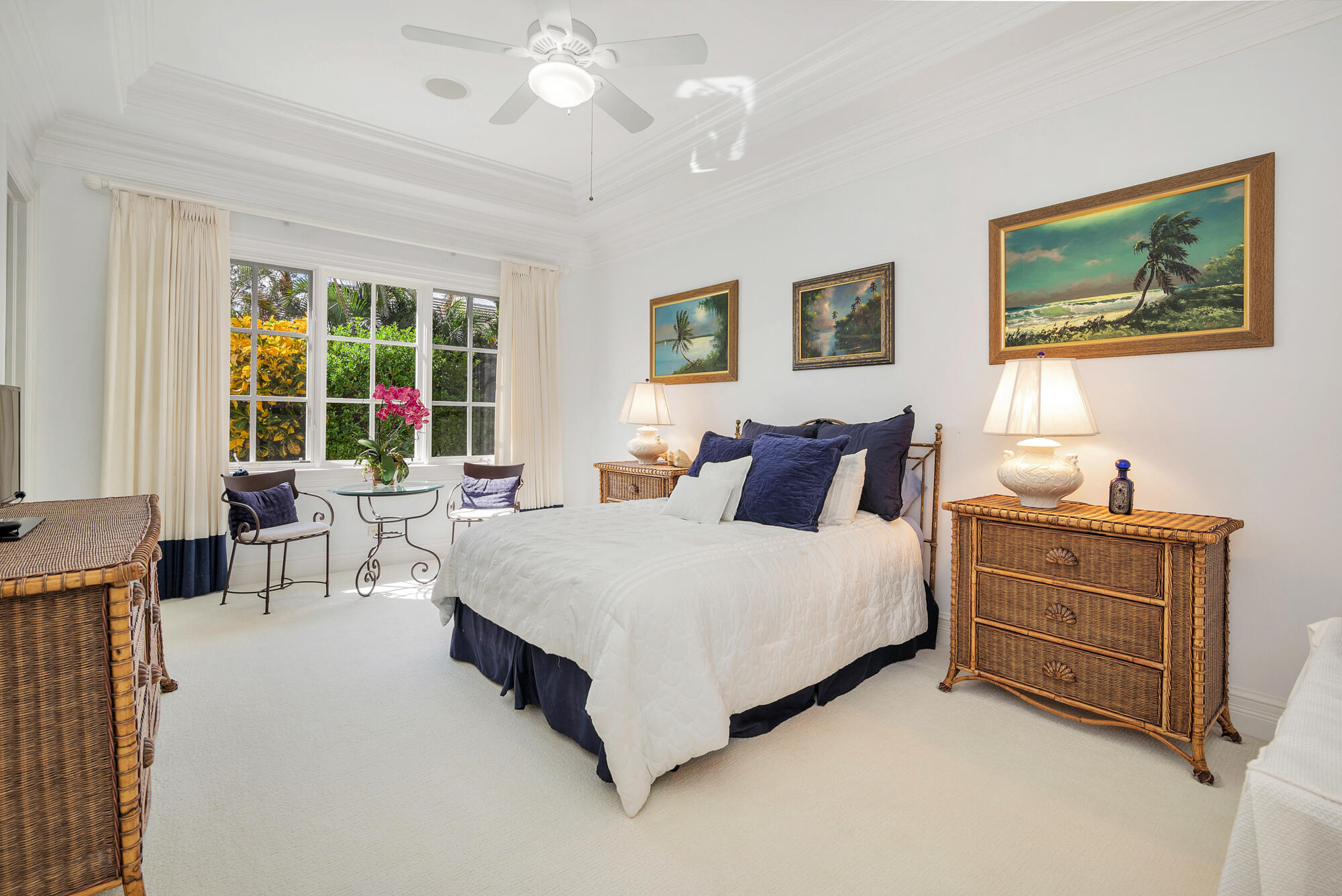 19223 North Riverside Drive Tequesta, FL 33469 - Photo 35 of 83 a spacious bedroom with a bed and a table