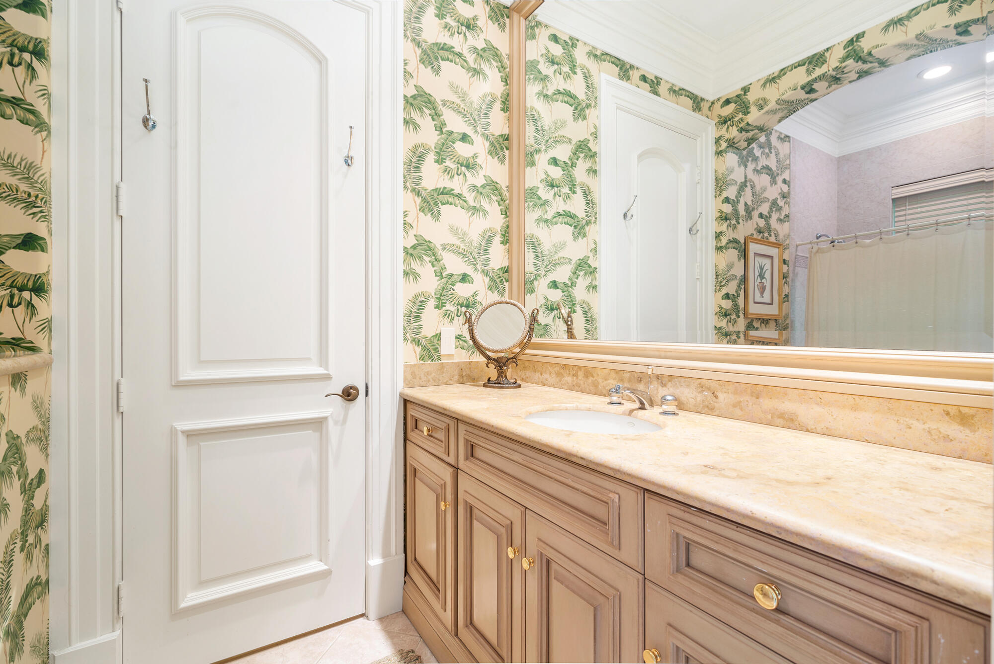 19223 North Riverside Drive Tequesta, FL 33469 - Photo 40 of 83 a bathroom with a granite countertop sink and a mirror