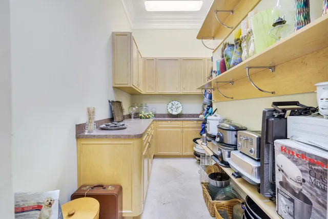a view of a house with patio and lake view