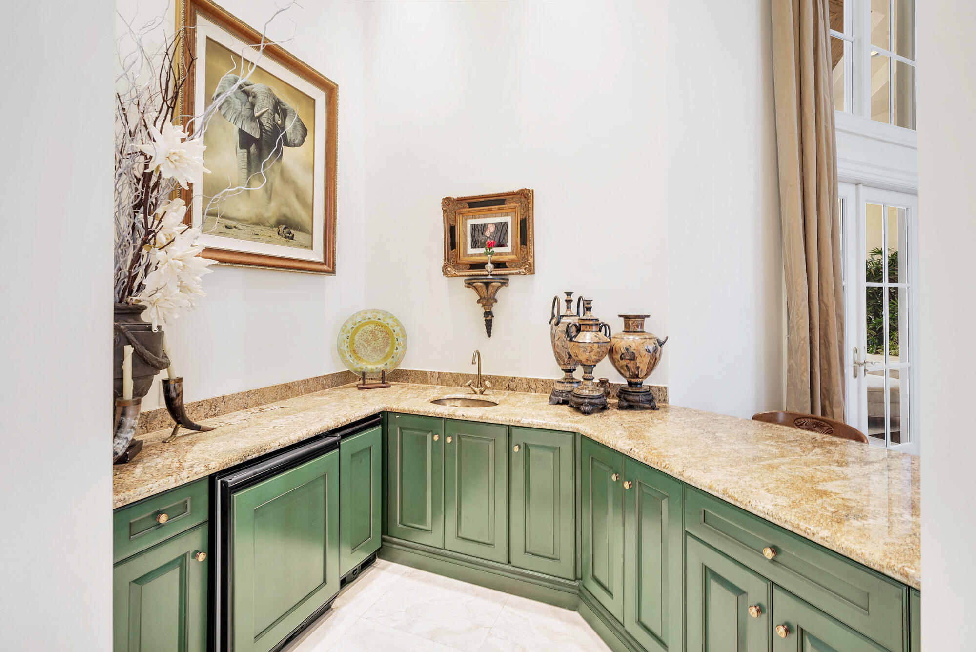 19223 North Riverside Drive Tequesta, FL 33469 - Photo 43 of 83 a kitchen with a sink and a stove