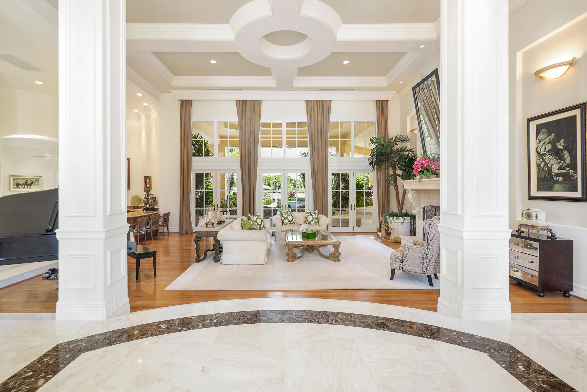 19223 North Riverside Drive Tequesta, FL 33469 - Photo 6 of 83 a view of a living room and floor to ceiling window or kitchen