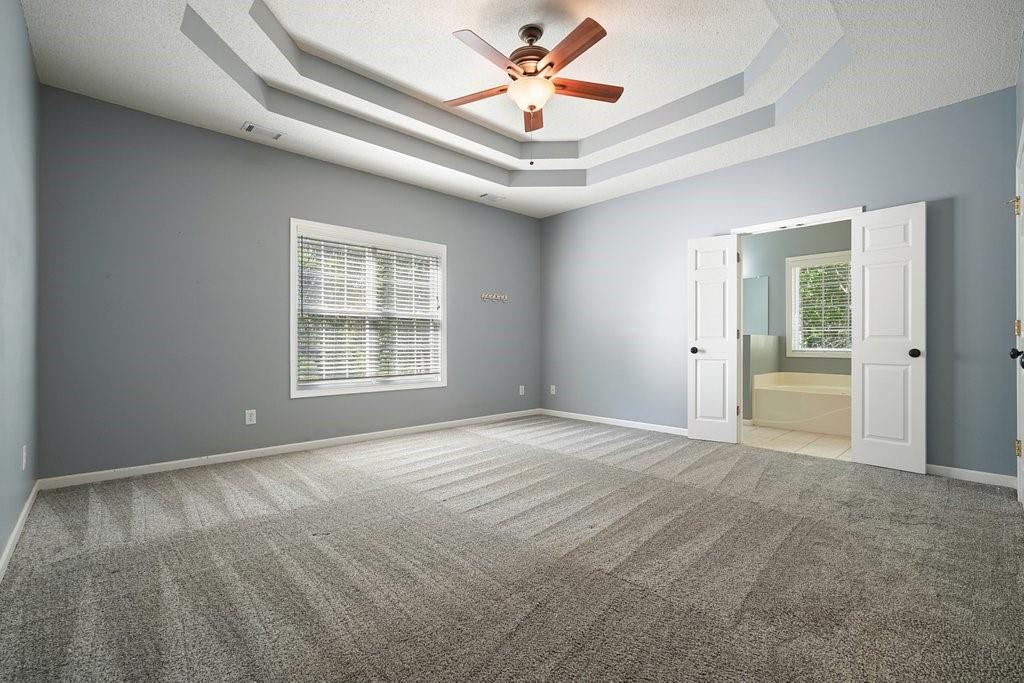 710 Bedford Trace Canton, GA 30114 - Photo 17 of 44 a view of an empty room with a window