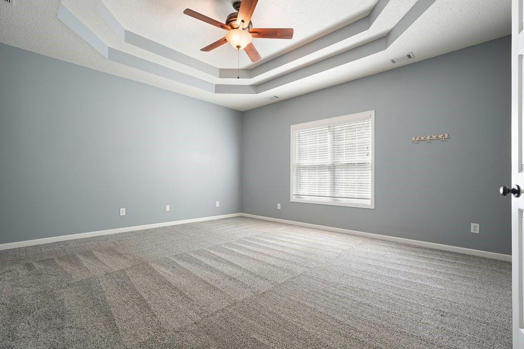 710 Bedford Trace Canton, GA 30114 - Photo 19 of 44 a view of an empty room with a window