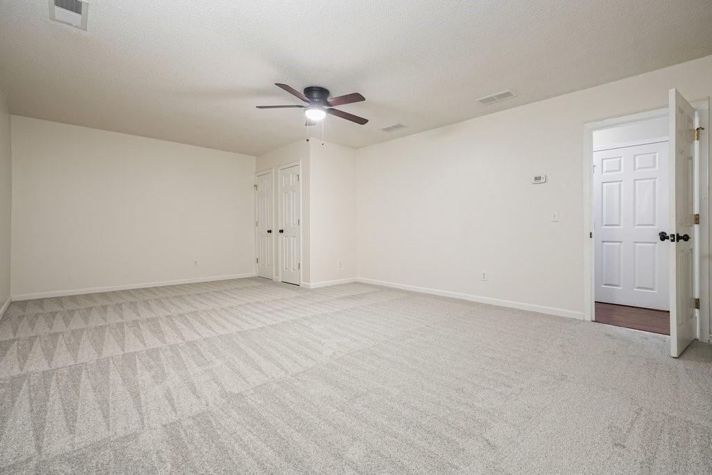 710 Bedford Trace Canton, GA 30114 - Photo 30 of 44 wooden floor in an empty room