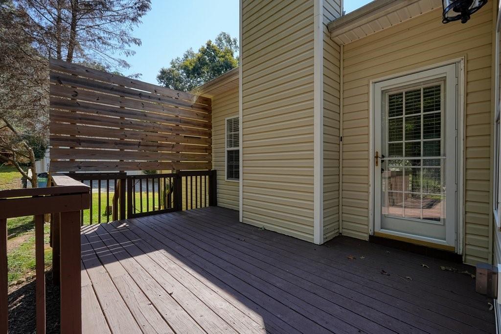 710 Bedford Trace Canton, GA 30114 - Photo 41 of 44 a view of a backyard with wooden floor