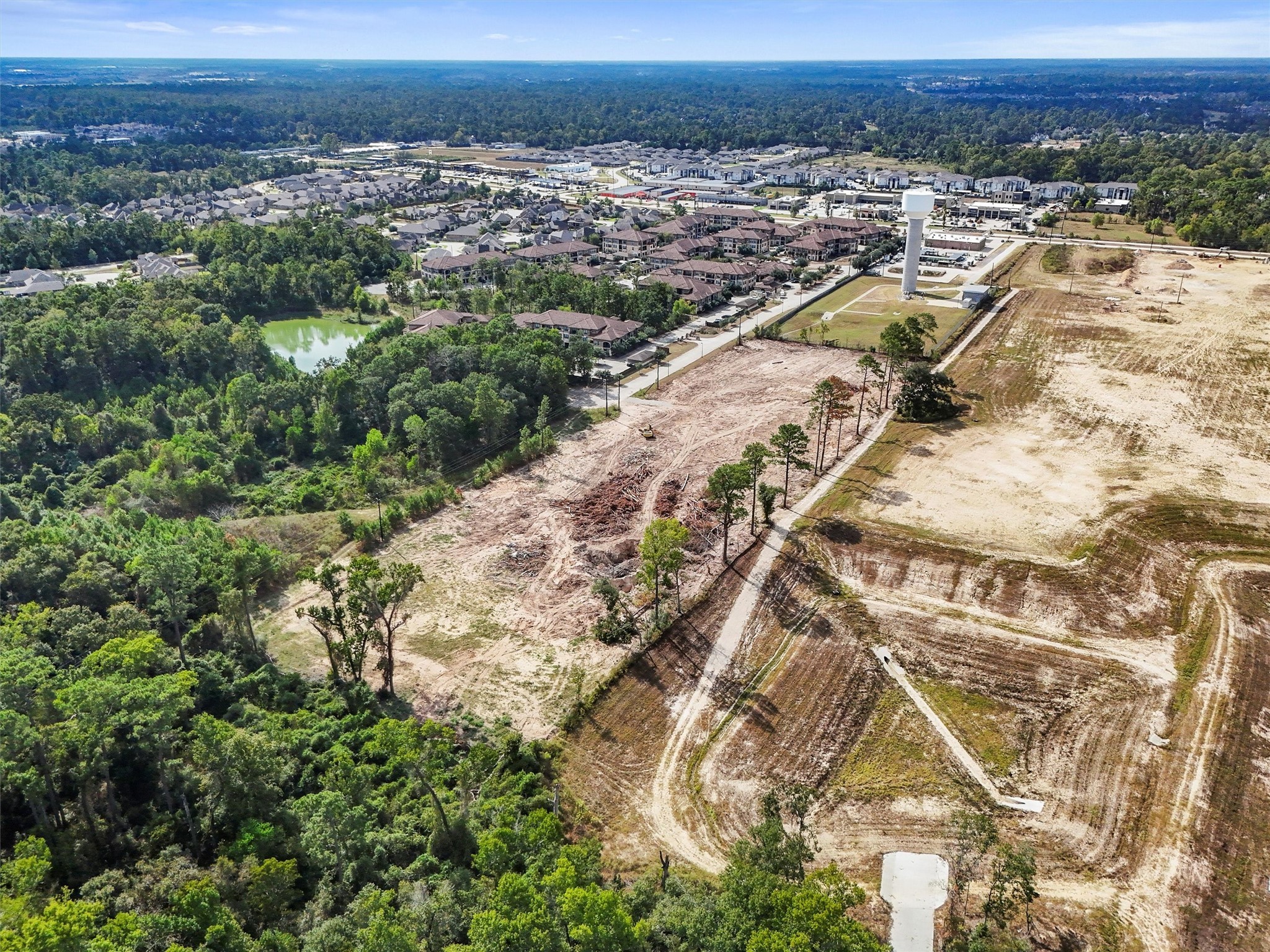 24810 Gosling Road Spring, TX 77389 - Photo 20 of 22 an aerial view of residential houses with outdoor space