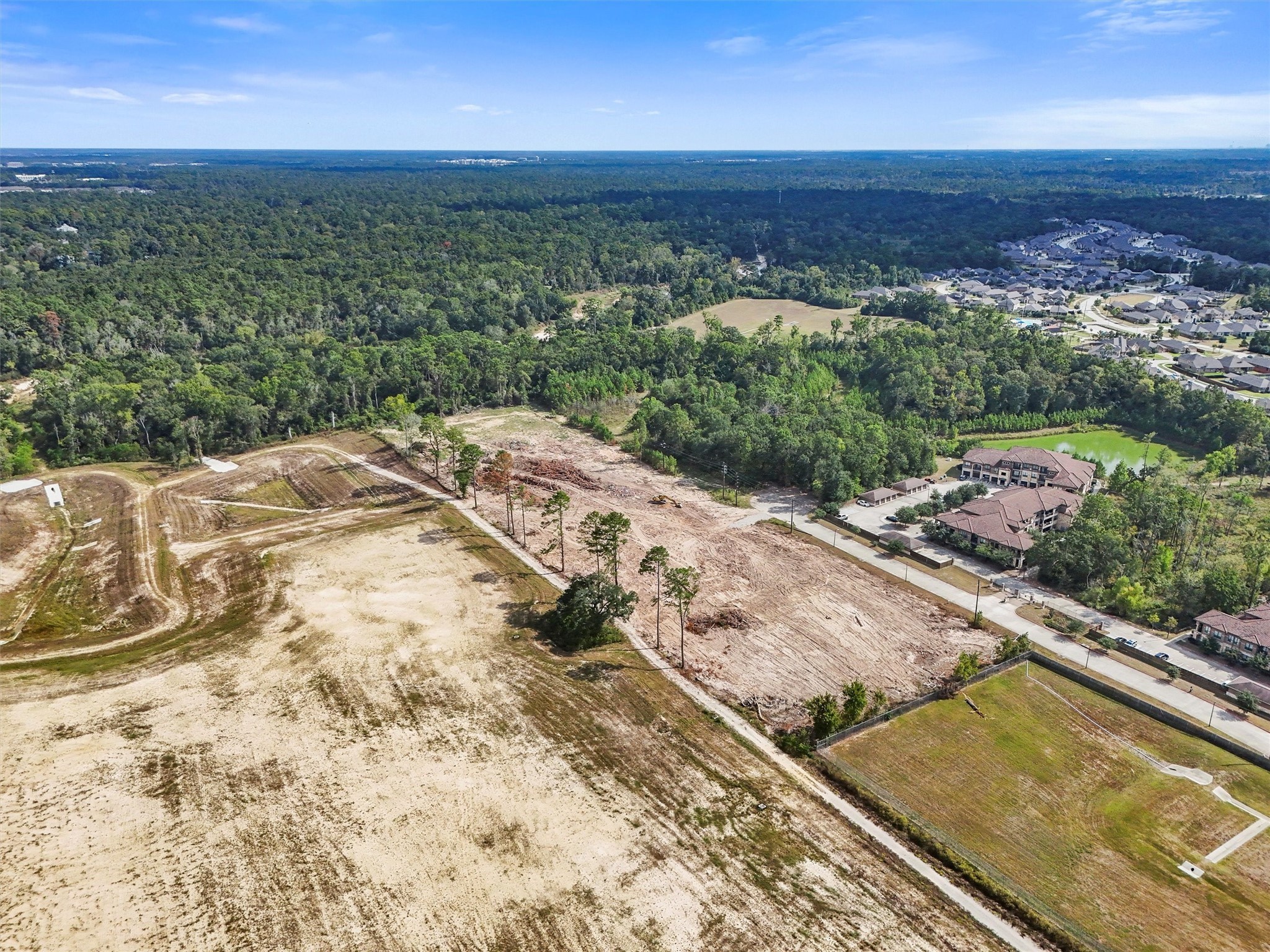 24810 Gosling Road Spring, TX 77389 - Photo 22 of 22 a view of a lake with a mountain