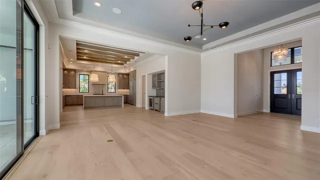 a kitchen with a stove a sink and a microwave