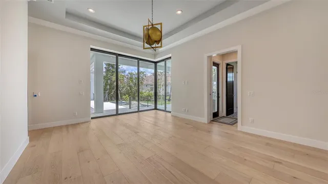 a room with closet and wooden floor