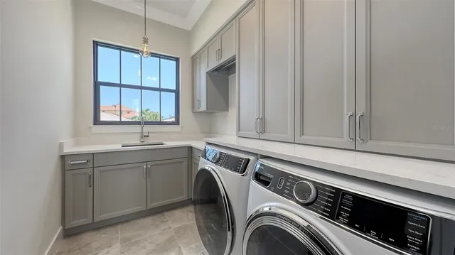 a view of swimming pool with outdoor seating and plants