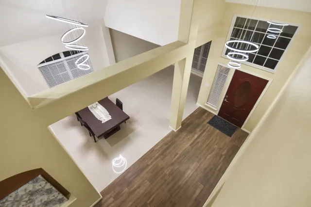 a view of living room with furniture and rug