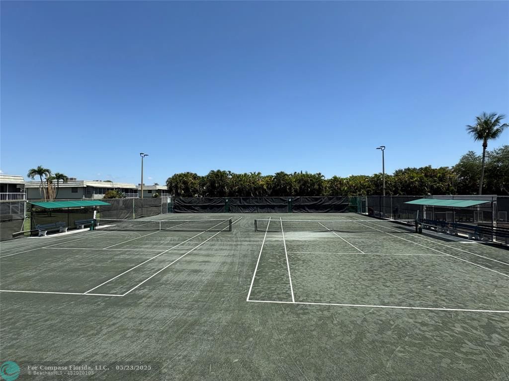 633 Brittany K, Unit 633 Delray Beach, FL 33446 - Photo 19 of 19 a view of a tennis court