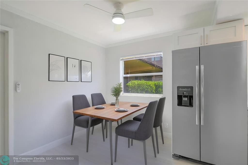 633 Brittany K, Unit 633 Delray Beach, FL 33446 - Photo 8 of 19 a view of a dining room with furniture window and outside view