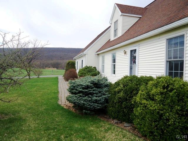 7919 Springhouse Road New Tripoli, PA 18066 - Photo 6 of 22 a view of a house with a yard